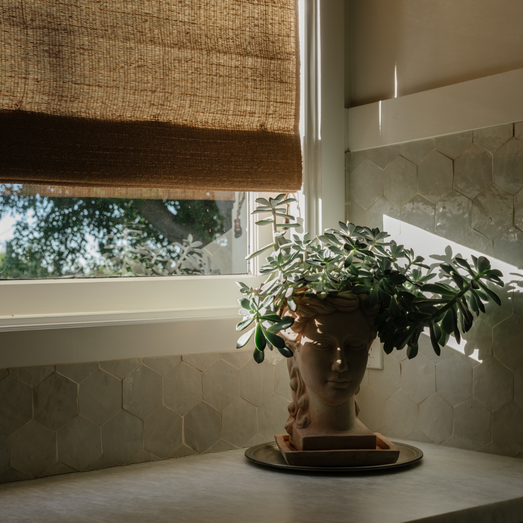 Close-up of a handwoven shade with natural fiber detail