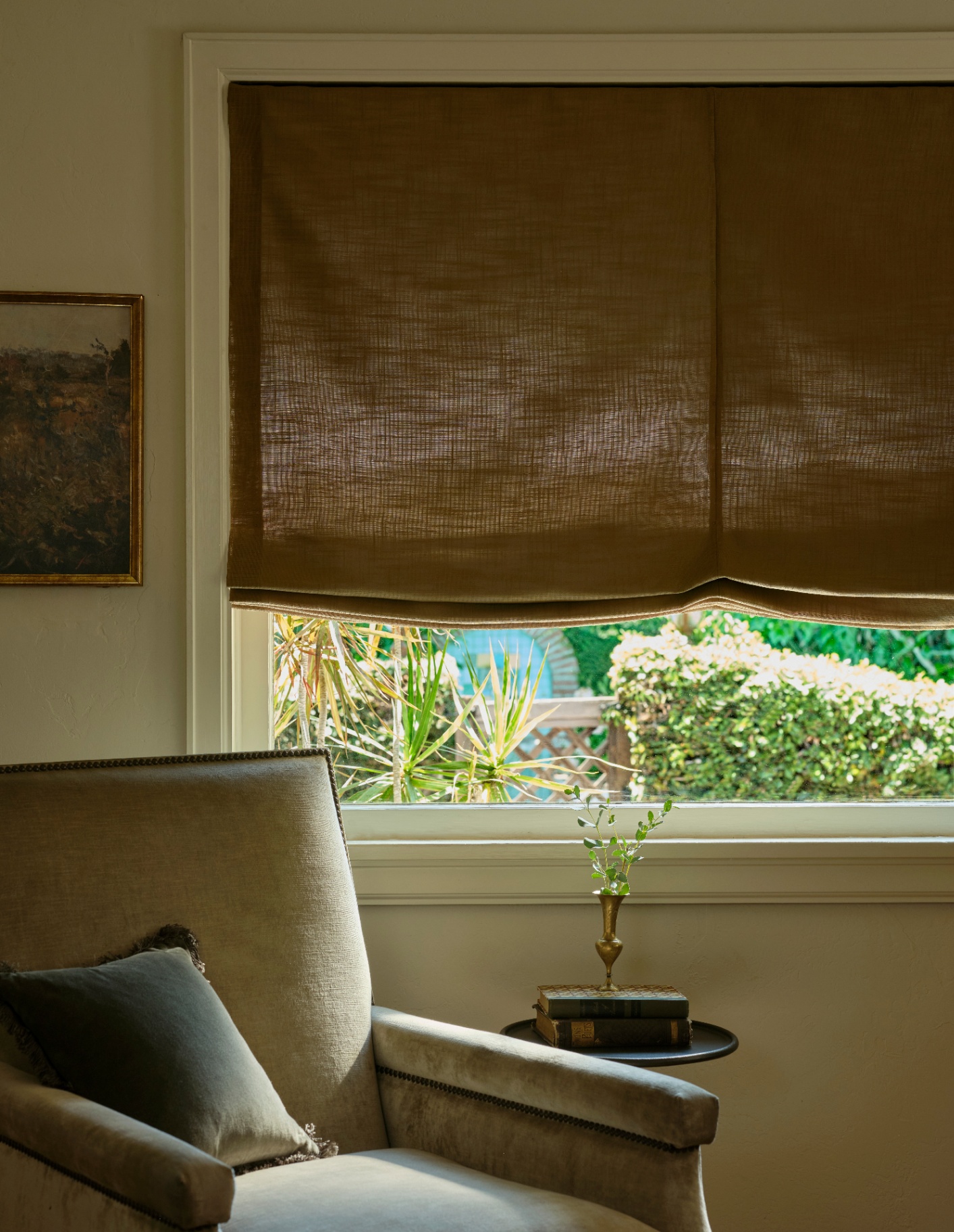Patterned drapery and Roman shade in a modern living room